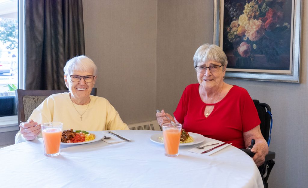 smiling residents dining