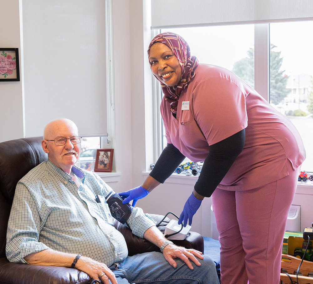 nurse helping resident