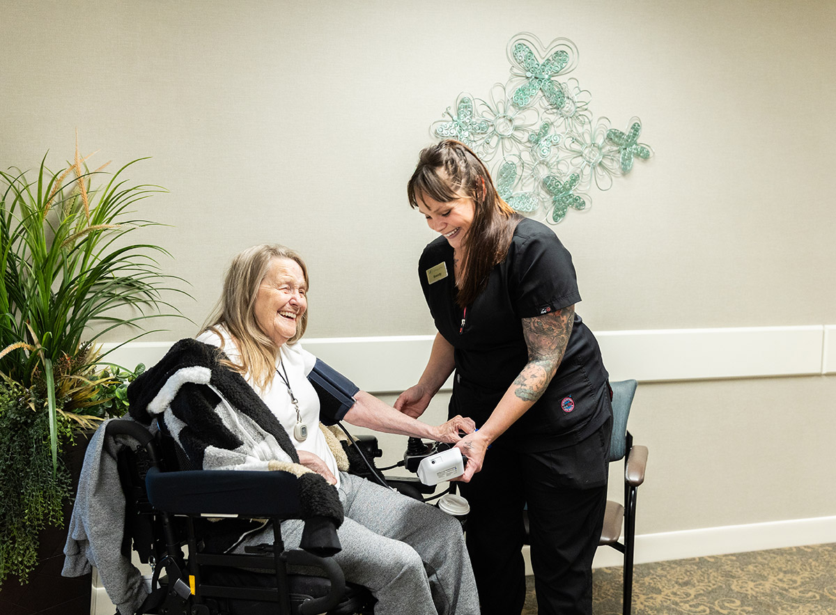 resident being cared for by nurse