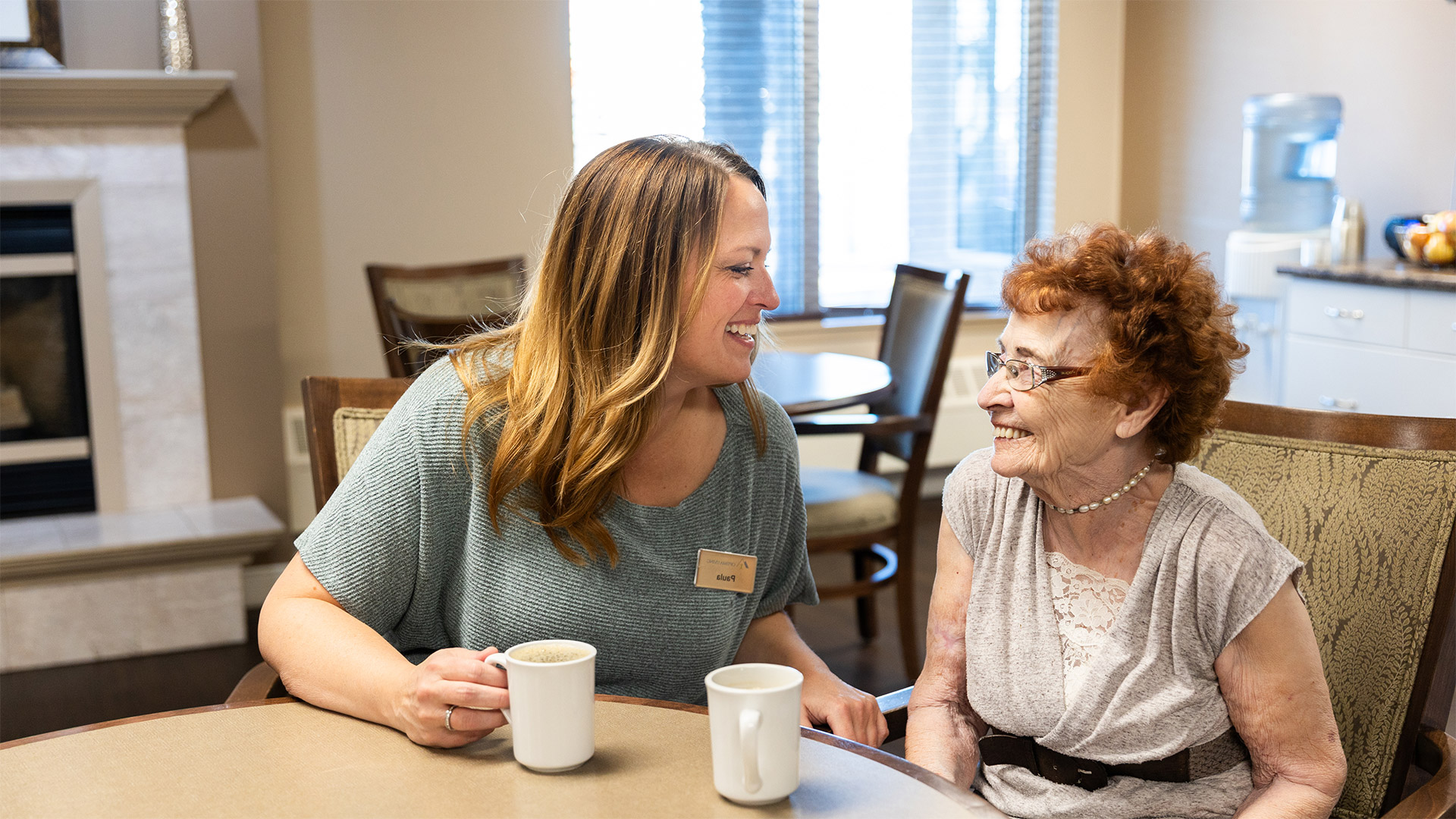 staff having coffee with resident