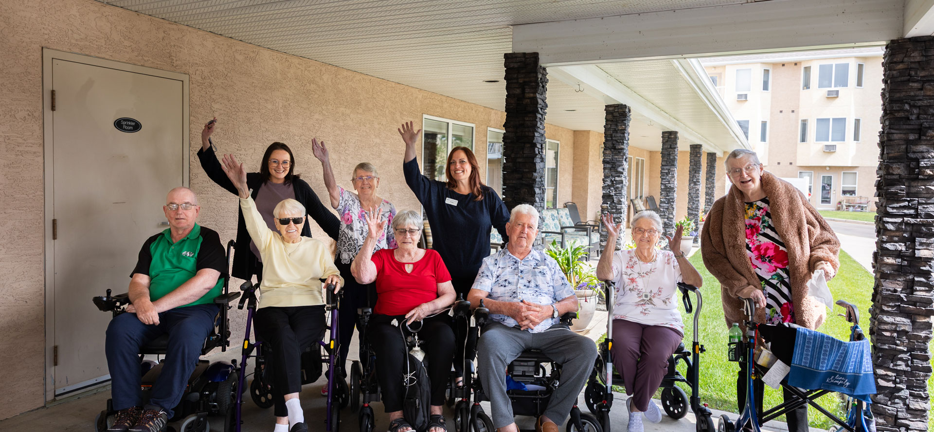 team members and residents outside