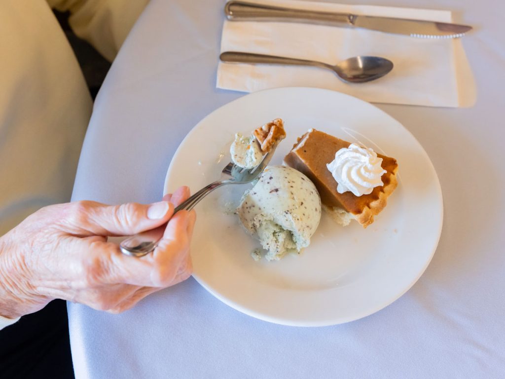 top down view of resident eating dessert